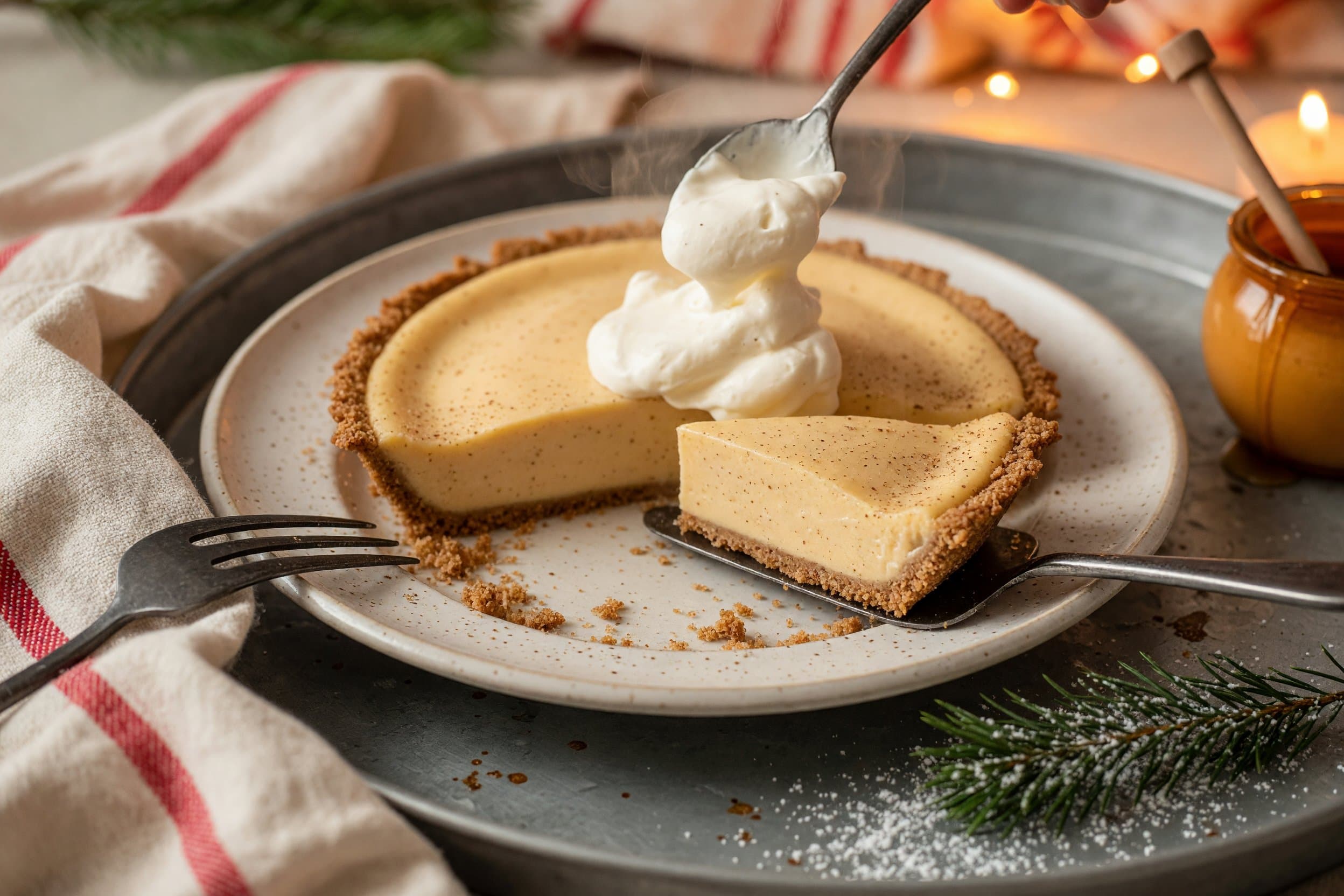 Slice your pie, top with some whipped cream and enjoy! while preparing Egg Nog Cream Pie