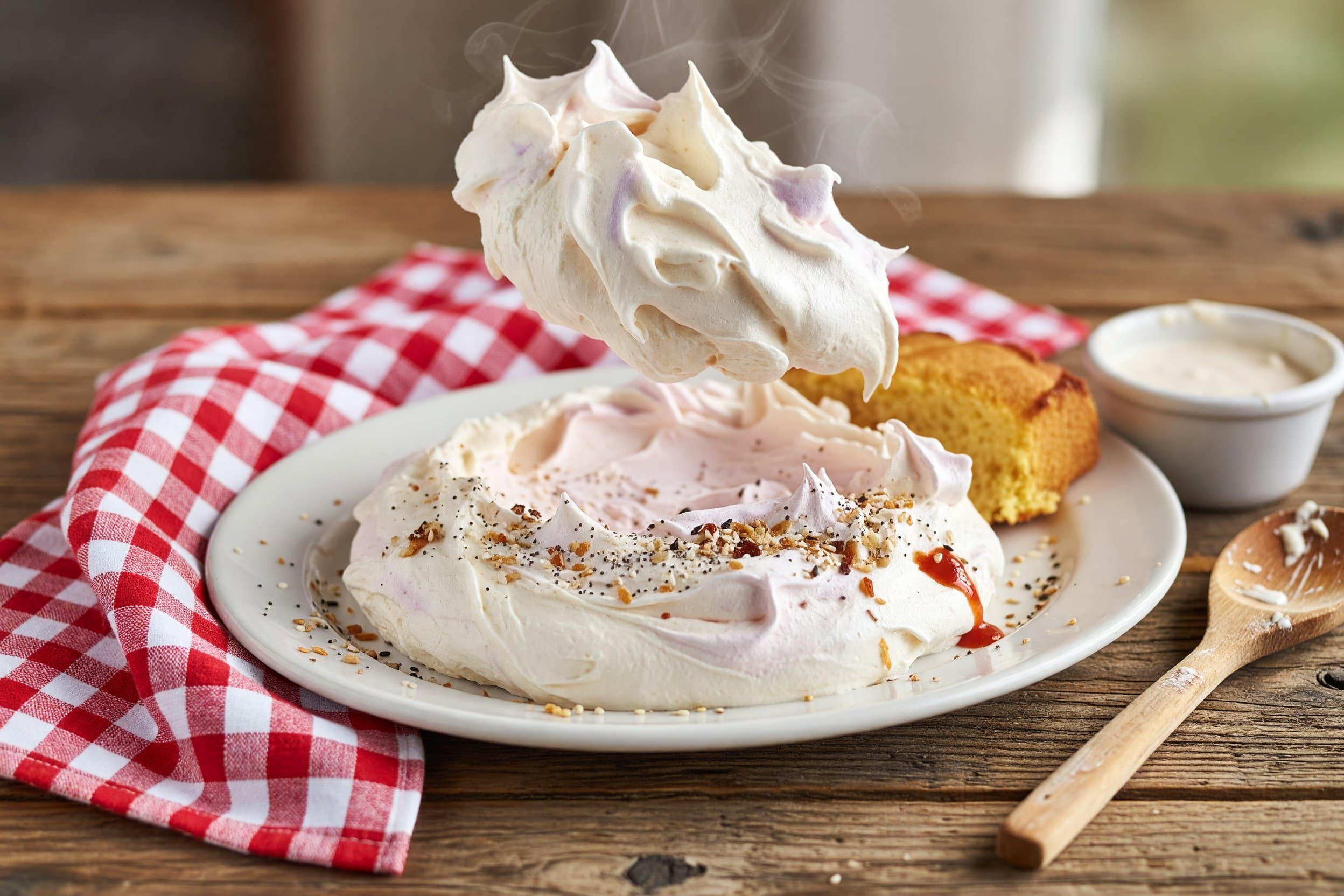 Transfer your fluffy batter to a baking sheet and shape it into a circle while preparing Cloud Bread