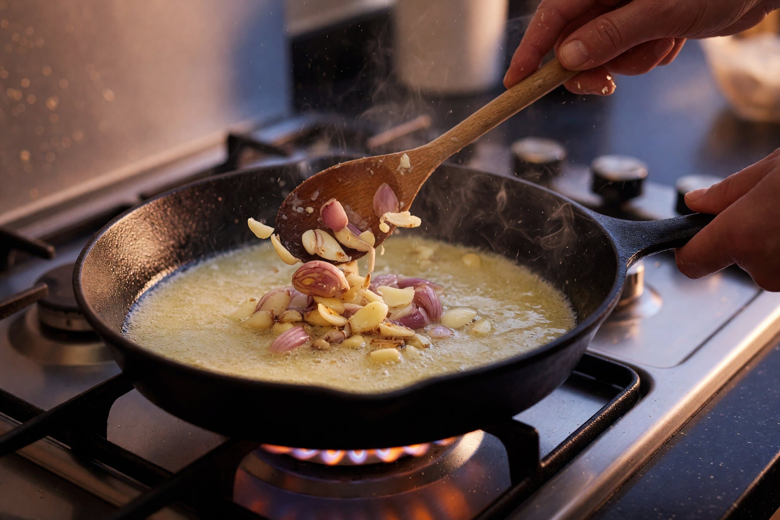 Sauteing garlic and shallot while preparing Broccoli & White Cheddar Pasta