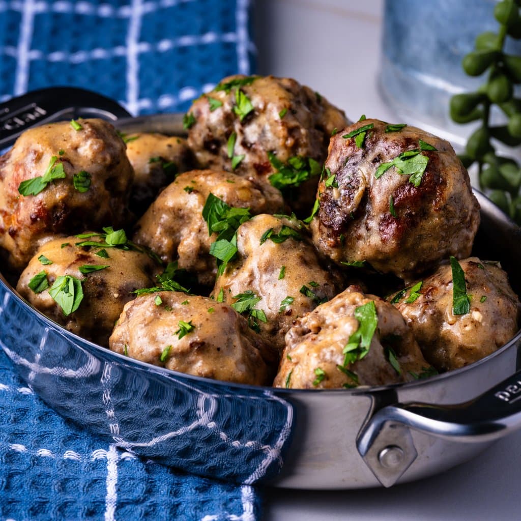 Swedish meatballs nestled in a creamy, golden-brown sauce — comfort food at its finest.