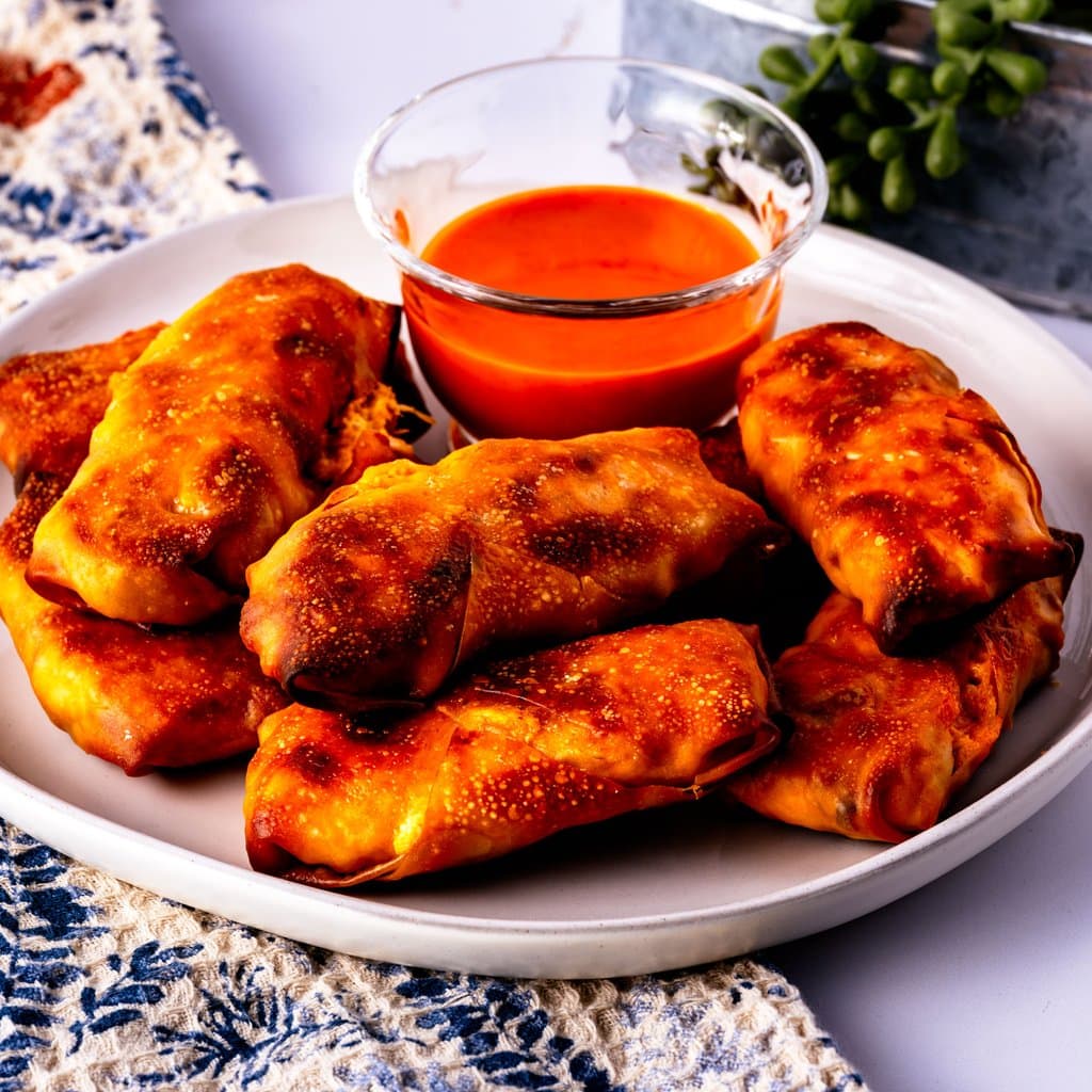 Golden, crispy buffalo chicken egg rolls served with ranch dipping sauce.